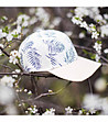 Светлобежова unisex шапка с тъмносин флорален принт Inillio-3 снимка