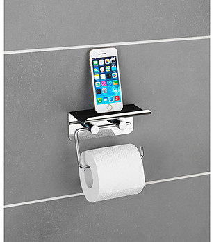 Поставка за тоалетна хартия и смартфон снимка