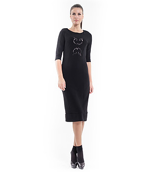 Черна рокля с декоративен елемент Tia снимка