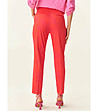Оранжево-червен дамски панталон с флорален принт в розово Juli-1 снимка
