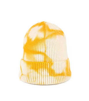 Детска шапка в бяло и жълто снимка