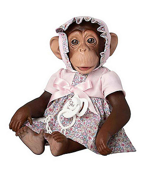 Бебе маймунка Лола с розова рокля на цветя снимка