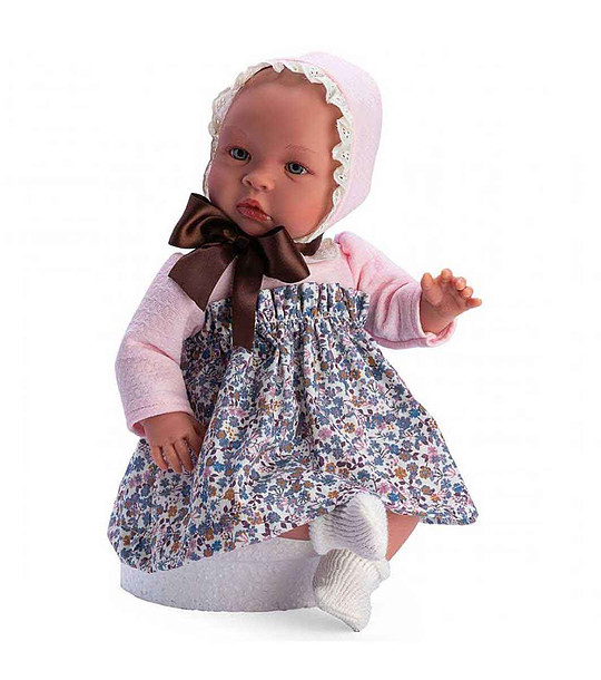 Кукла-бебе, Лея, с рокля на сини цветя и голяма кафява панделка снимка