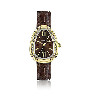 Златист дамски часовник с кафява кожена каишка Royalty снимка