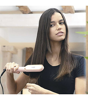 Преса за коса с иновативен дизайн снимка