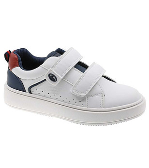 Детски сникърси в бяло и тъмносиньо снимка