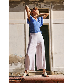 Бял дамски панталон с широки крачоли снимка