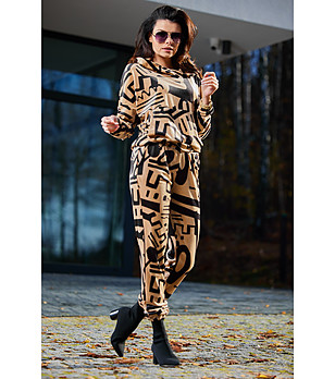 Дамски панталон в бежово и черно с принт Praxie снимка