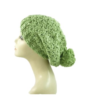 Дамска зимна шапка с ажурен помпон снимка