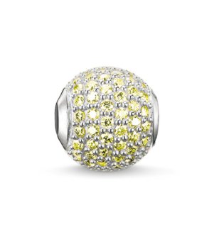 Сребрист талисман с жълти кристали снимка