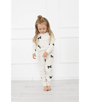 Памучна детска пижама в цвят екрю Figaro с принт панделки снимка
