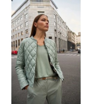 Дамско светлозелено капитонирано яке  снимка
