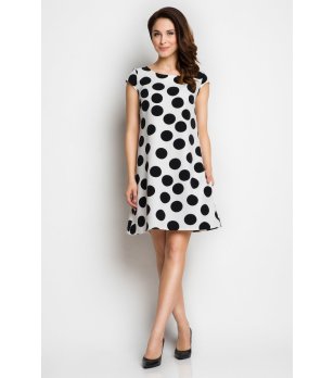 Бяла рокля на едри точки снимка