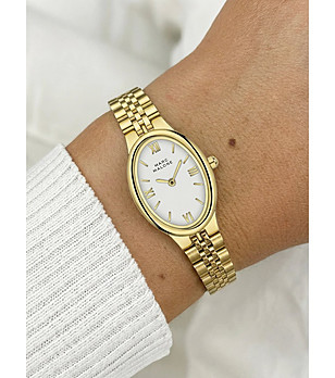 Дамски златист часовник с бял овален циферблат  снимка