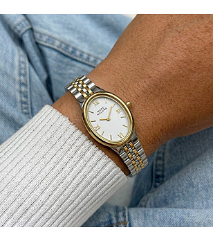 Дамски кварцов часовник в сребристо и златисто с овален бял циферблат  снимка